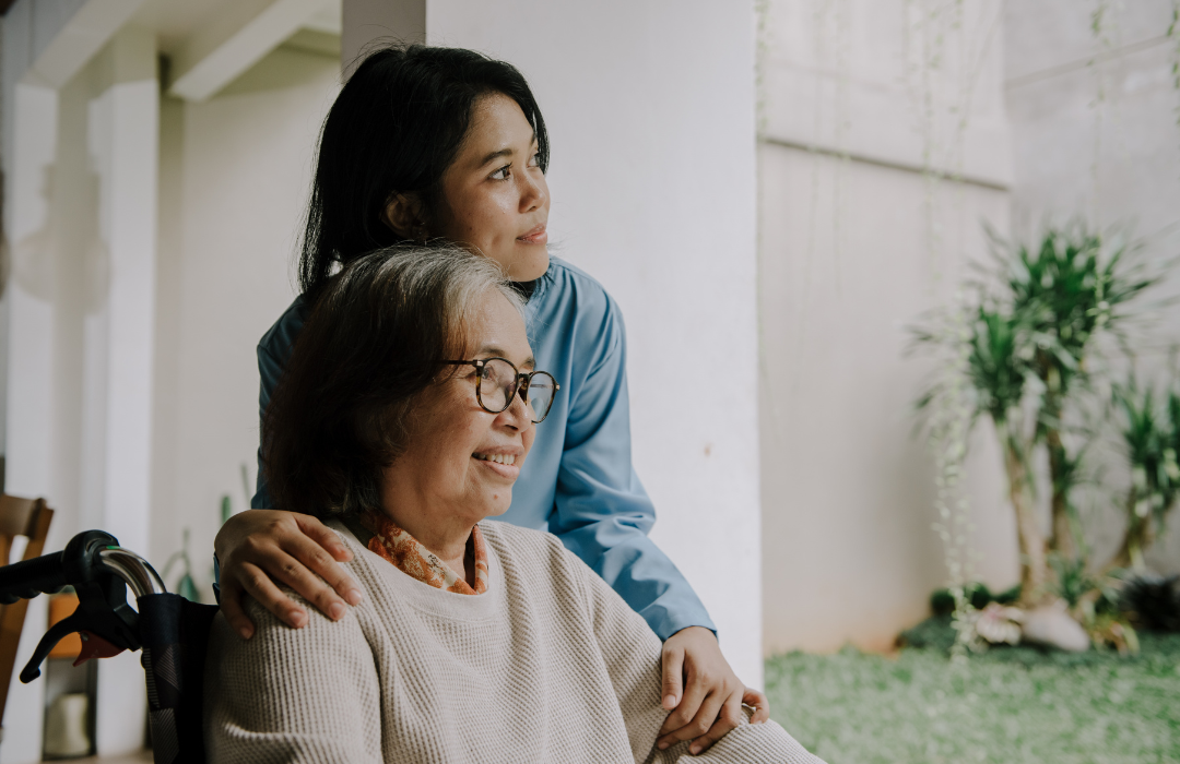 Hospice nurse coordinating patient care with physicians and family members